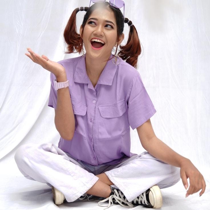 Kaveri Mehta, Lead Design Curator at Silver Autumn Pathway, reviewing corporate floral arrangements